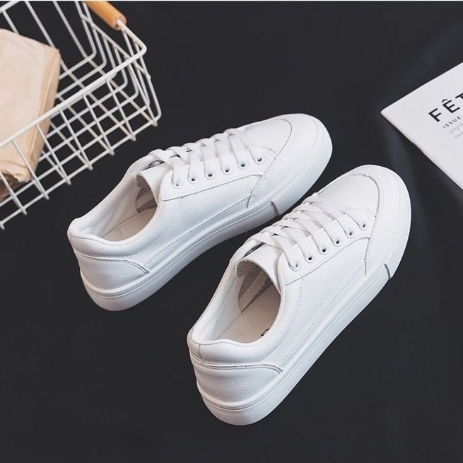 Sneakers bianche in pelle da donna scarpe da skater stringate_voghion.com
