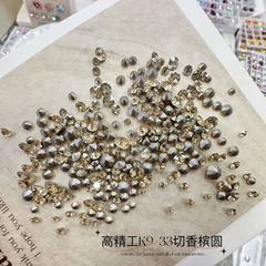 高品質k 9は華の先の底の33の切断面のシャンパンの小さい丸いドリルの超きらめく爪のガラスのドリルの爪の装飾の源の卸売りをまねます。