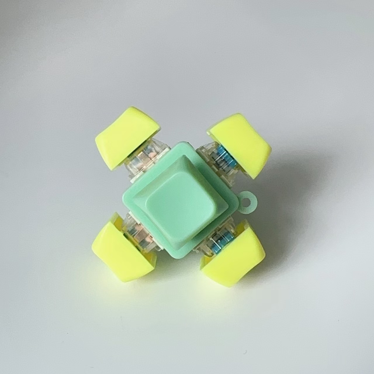 Special-shaped six-button green shell-yellow