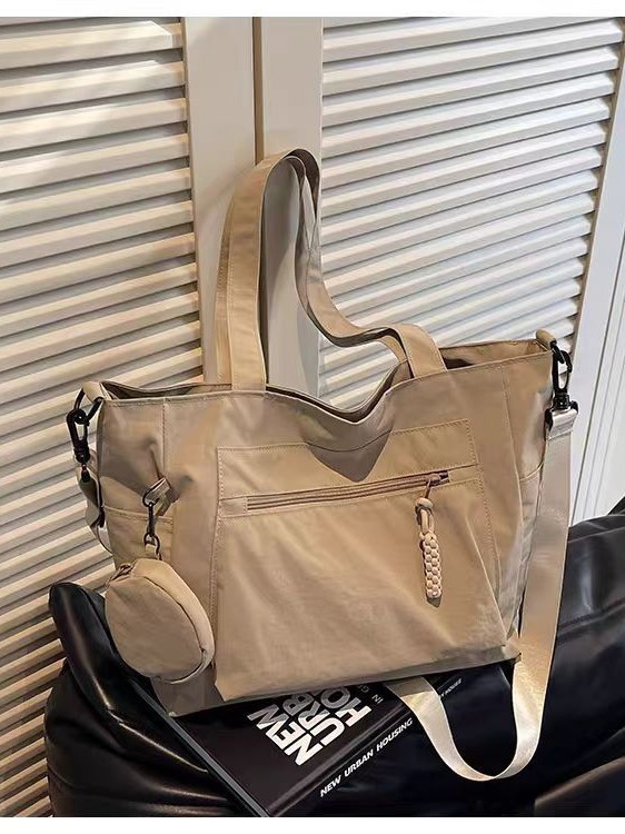 Transfronterizos casuales de color sólido nylon bolso de mano nueva bolsa de tela de transporte de gran capacidad simple y ligera mochila de hombro