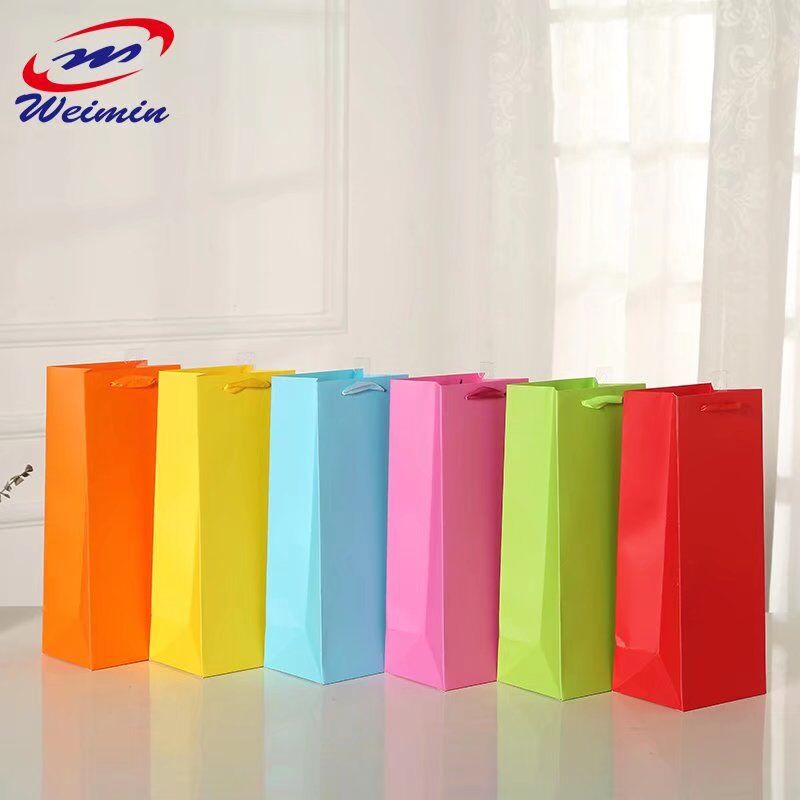 厂家定丶做纸袋 服装牛皮纸手提袋 白卡纸礼品包装袋 购物袋