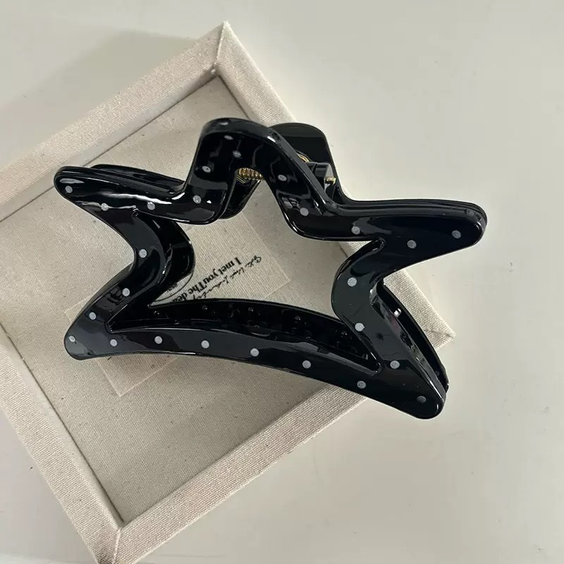 Black polka dot five-pointed star