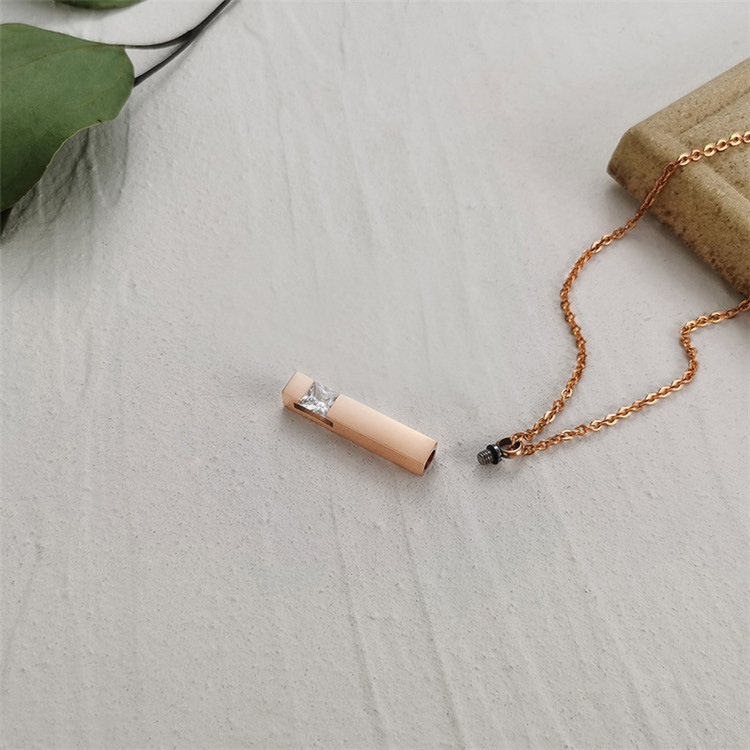 Coreano simple diamante perfume colgante ataúd cinerario Collar cinerario de piedra conmemorativa geométrica elegante de acero de titanio
