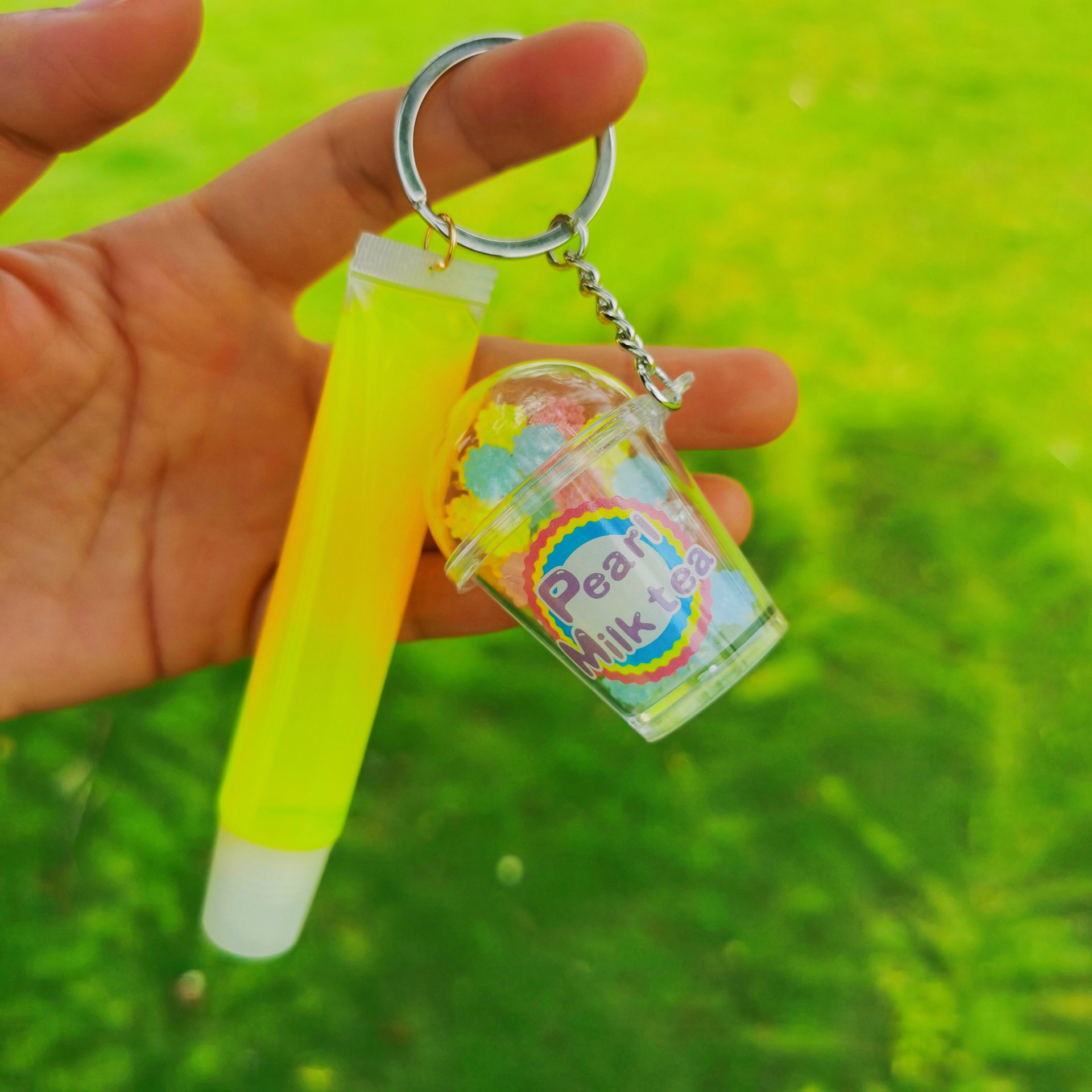 Shangxin niños cosméticos mecedora música llavero colgante tropical fruta niños piel bola colgante labio esmalte no lo