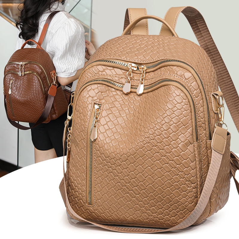 Fábrica al por mayor 2024 nueva mochila de cuero suave para mujer coreana Mochila de viaje al aire libre multifuncional de doble uso de moda