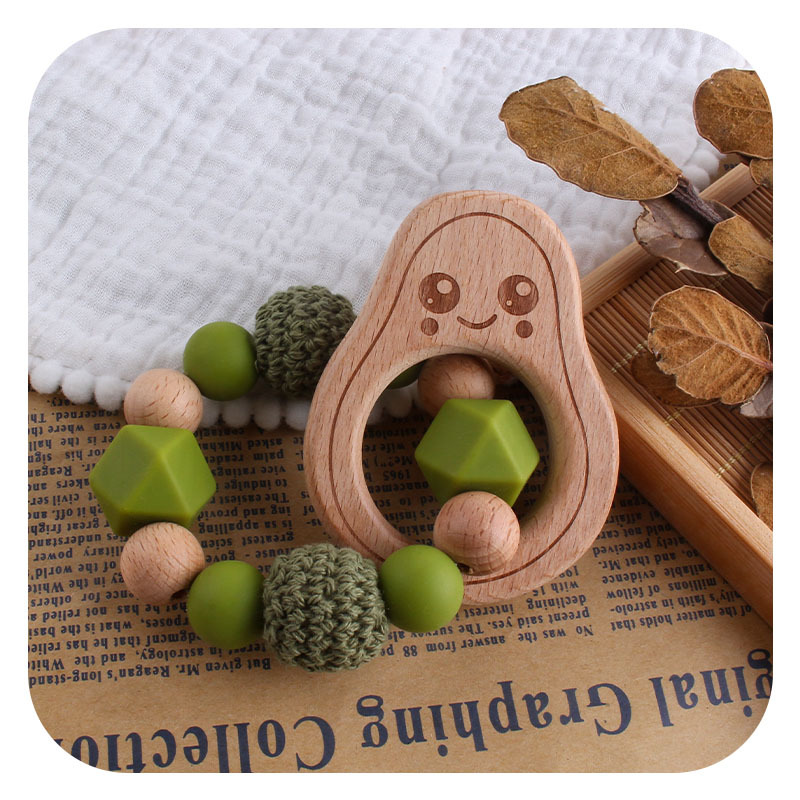 Nuevo DIY creativo de la historieta haya mordedor bebé haya aguacate silicona pulsera mordedor molienda varilla