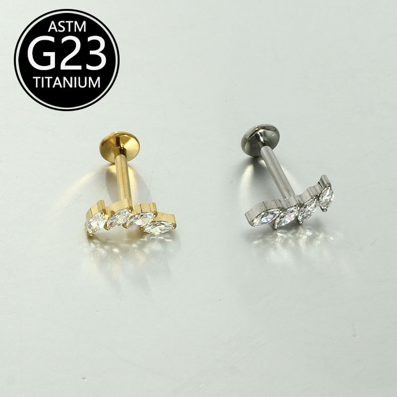 Silver pointed spike labret stud material detail