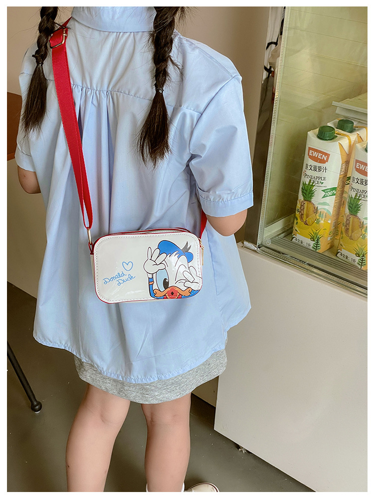 The 2025 new children's mobile phone bag is a trendy, fashionable, fresh, sweet, cartoonish, creative and simple single-shoulder crossbody bag for women undefined