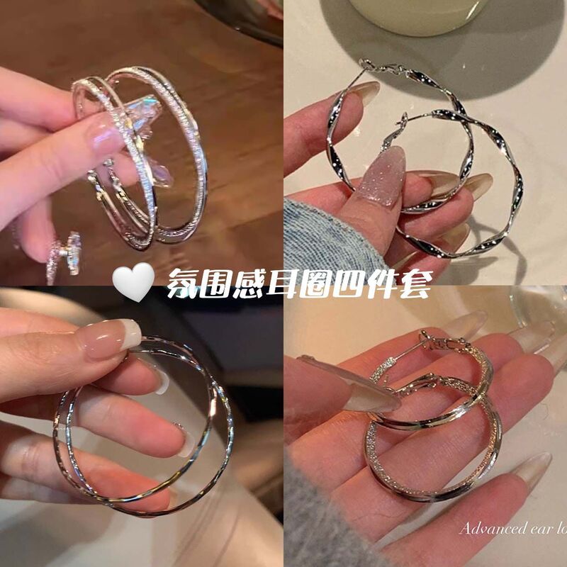 Exaggerated Silver Rotating Earrings 2025 New Popular Earrings Twist Large Earrings Niche Design High-End Earrings