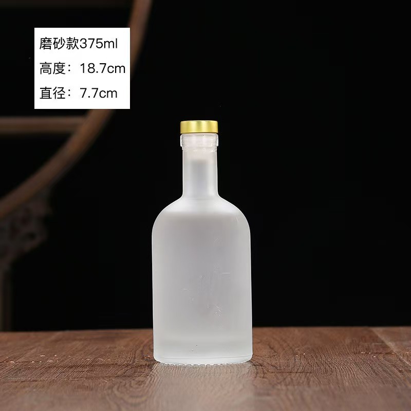 Botella de vidrio de vodka de alta calidad botella de vino de fruta cristal transparente de arena blanca dividida botella vacía con película de retracción térmica en stock