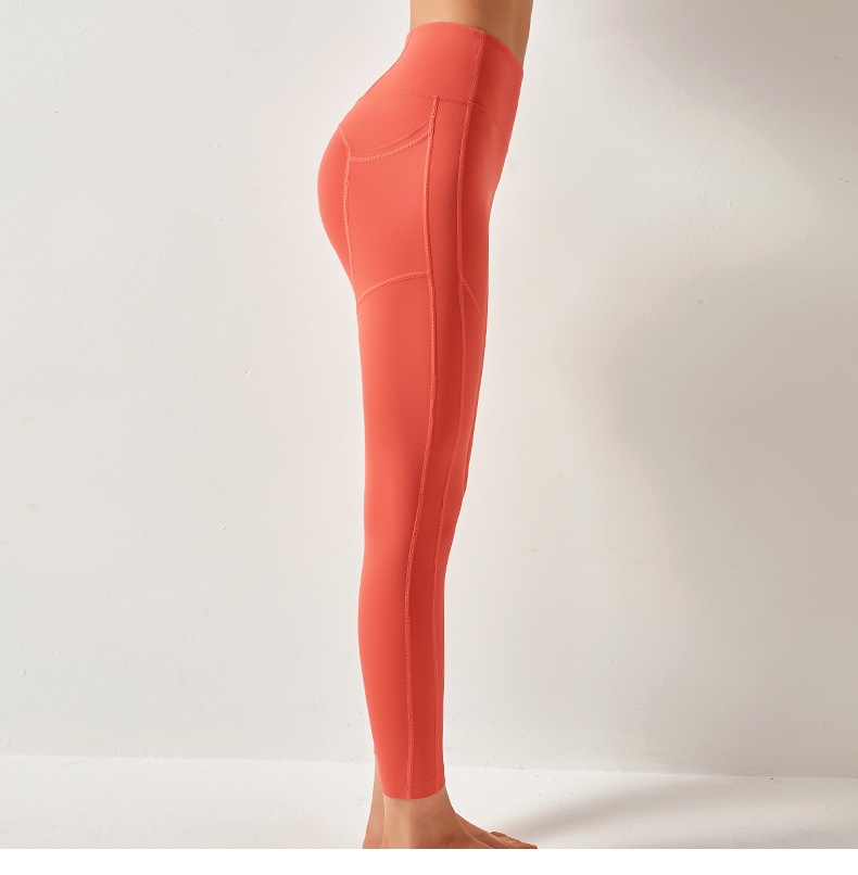 Pantalones de yoga de color sólido con bolsillos de cintura alta y cintura alta que levantan la cadera NSYWH127911