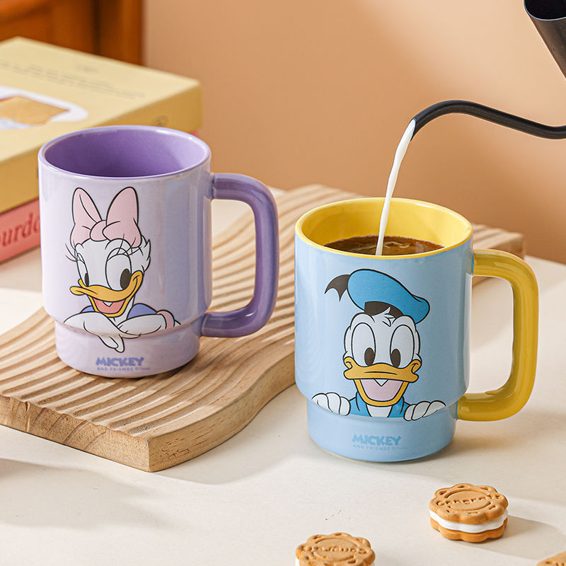 Taza de cerámica de Disney 2025 nueva taza de leche casera para niños linda taza de cuatro juegos de pareja