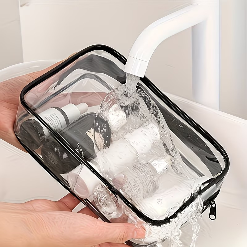 Bolsa de mano transparente de PVC transfronteriza, bolsa de almacenamiento de viaje impermeable de gran capacidad, bolsa de maquillaje impresa multifuncional