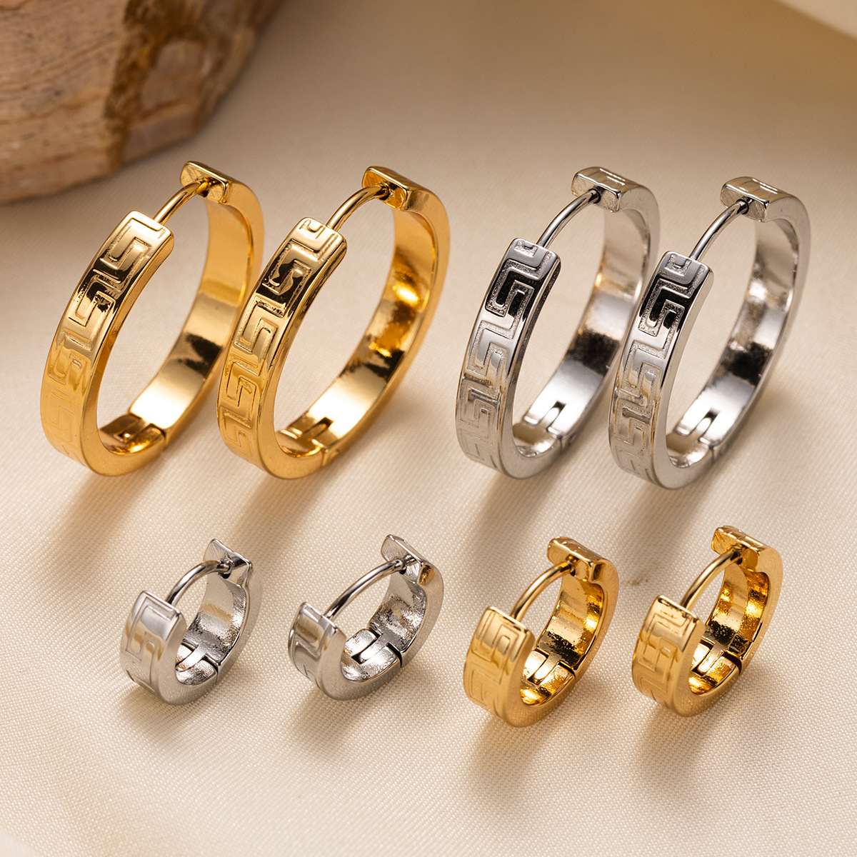 TENA Europa y América pendientes de acero inoxidable vacaciones nicho de diseño de textura de acero de titanio ligero lujo de alta calidad joyas para los oídos