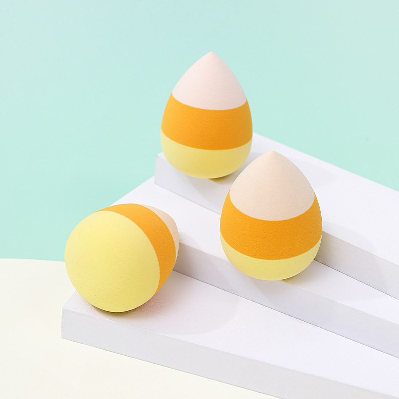 Customizado huevo de maquillaje de color mixto de tres colores polvo de maquillaje suave no comer polvo de maquillaje post de ropa de maquillaje esponja almohadilla de aire huevo de maquillaje