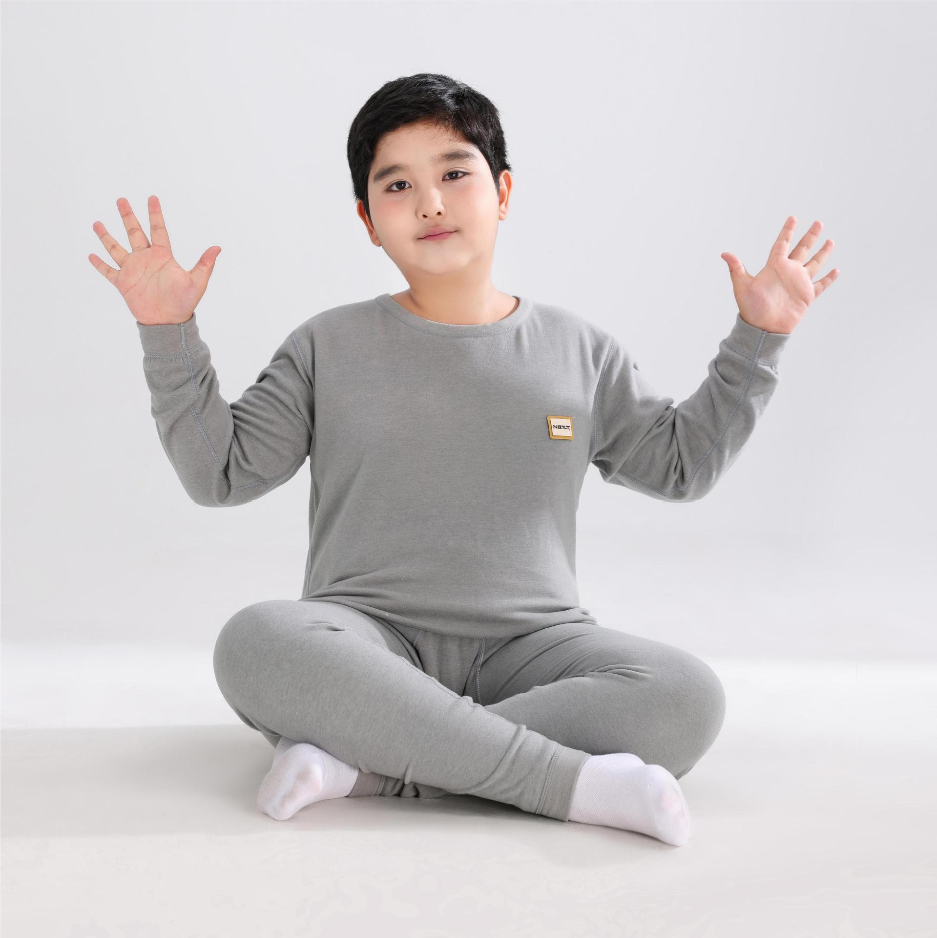 Pijama adolescente ropa de hogar para niños mayores para aumentar el peso de otoño y invierno lana seda grasa juego de pijamas calientes para niños