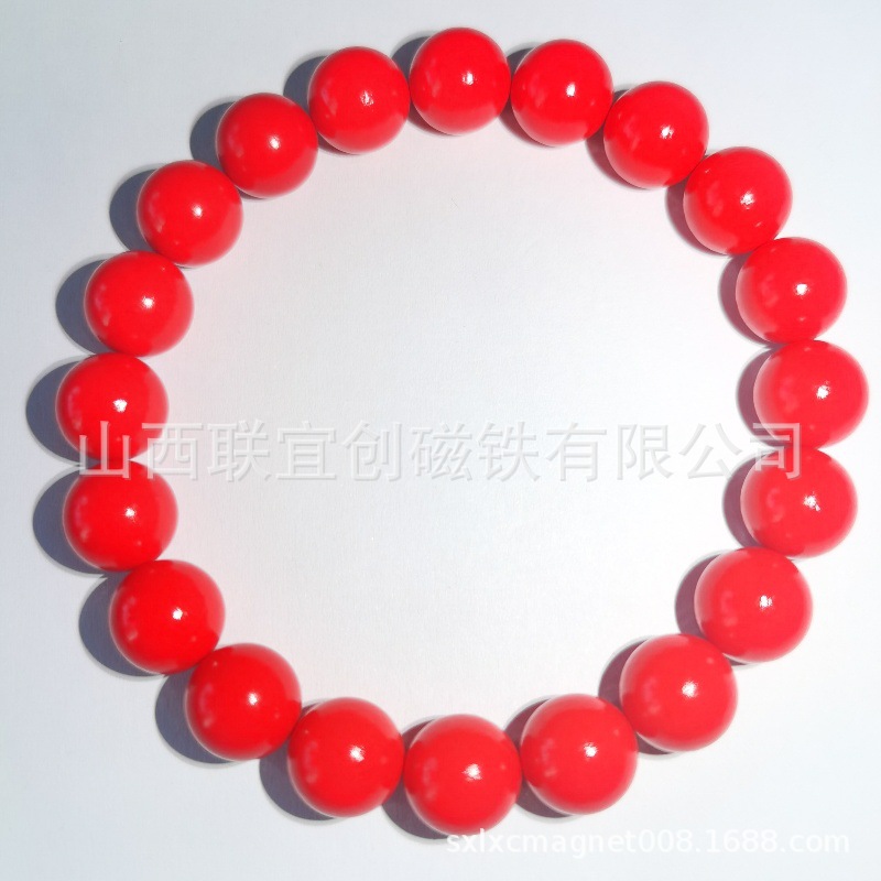 厂家供应4000-6000GS稀土永磁磁灸石无绳项链7mm珊瑚红磁能珠项链