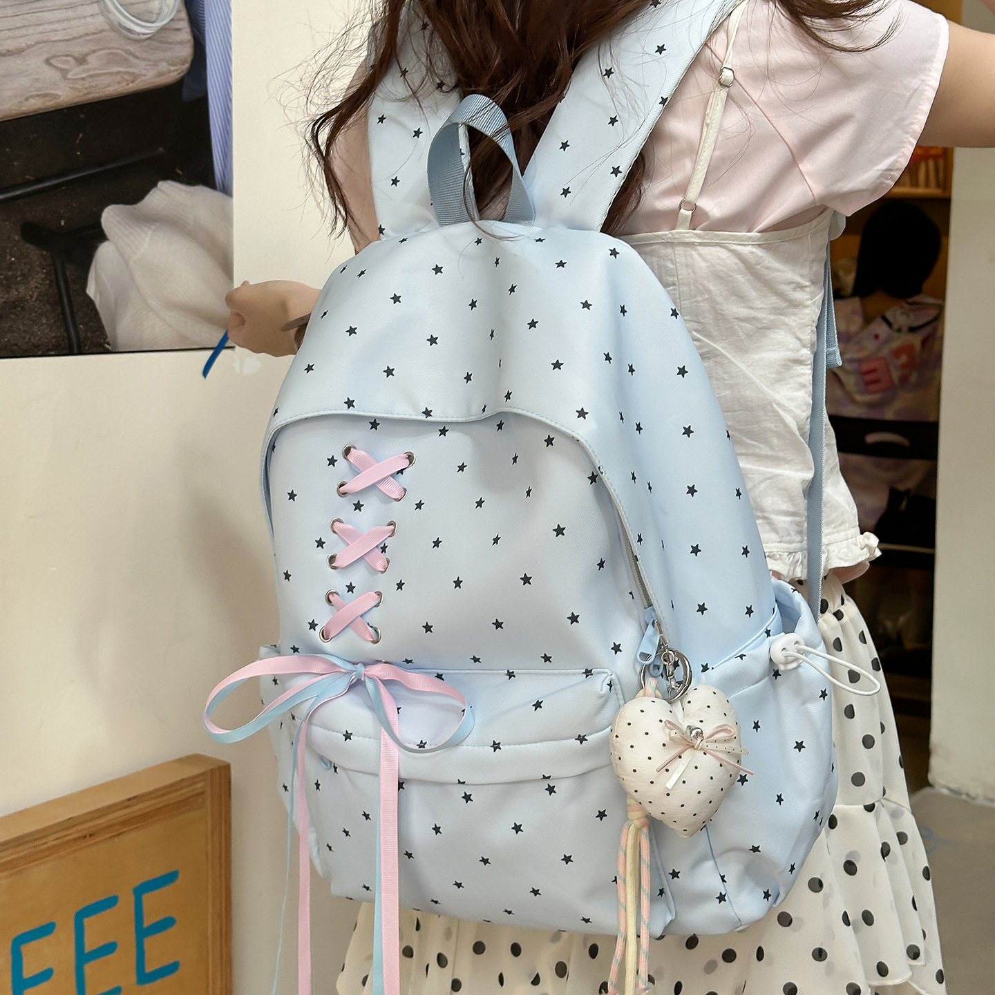 Highly stylish polka dot backpack for junior high school girls, with bow tie, large capacity, trendy and unique, lightweight school backpack