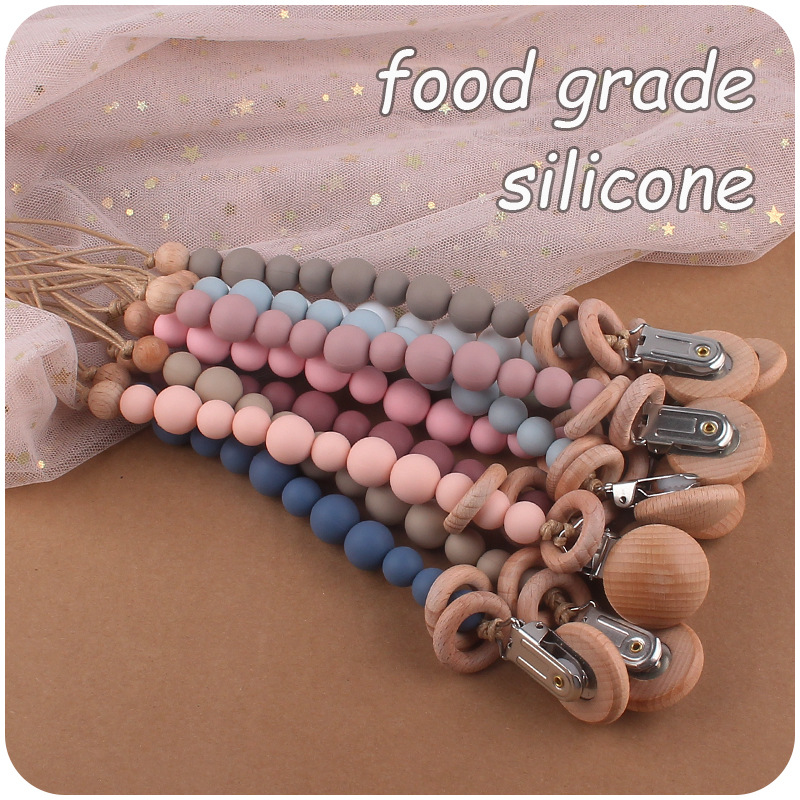 Nuevos suministros para bebés círculo de haya creativo bebé cuentas de silicona mordedura cadena de chupete molar cadena anti-caída
