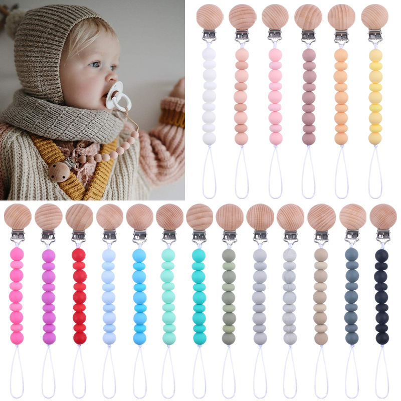 Nuevos suministros para bebés clip de chupete de haya calmante cuentas de silicona para bebés Cuentas planas mordedura Cadena de chupete cuerda anti-caída