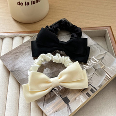 フランスのレトロなバレエ風の髪飾りのサテンの二重バッグの腰の蝶の結腸の輪の馬尾の髪輪の少女の百合の髪飾り