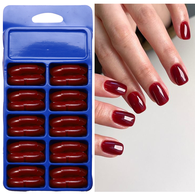 120 piezas de uñas falsas de color sólido desnudas cuadradas cortas desmontables de uñas en una caja azul