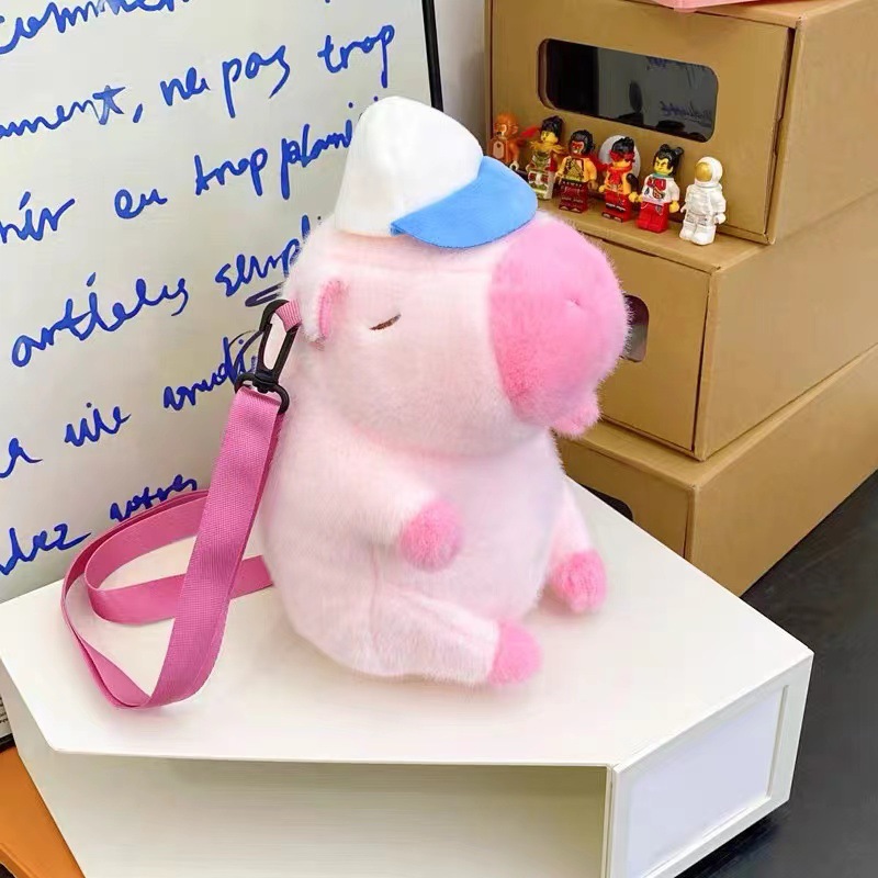 Venta directa de fábrica: bolsas de maquillaje de dibujos animados, muñecos de peluche, juguetes portátiles para niños, bolsos para mujer, muñecos de máquina de garras y otros productos.