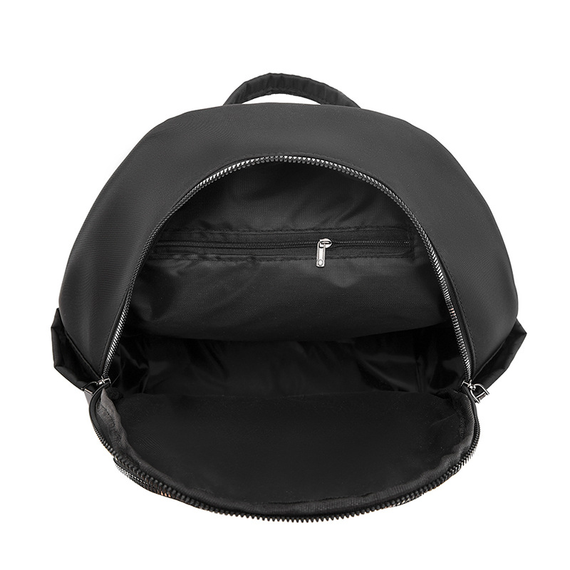 Comercio exterior al por mayor 2023 nueva mochila de nailon casual para mujer, mochila de viaje al aire libre literaria simple, mochila escolar