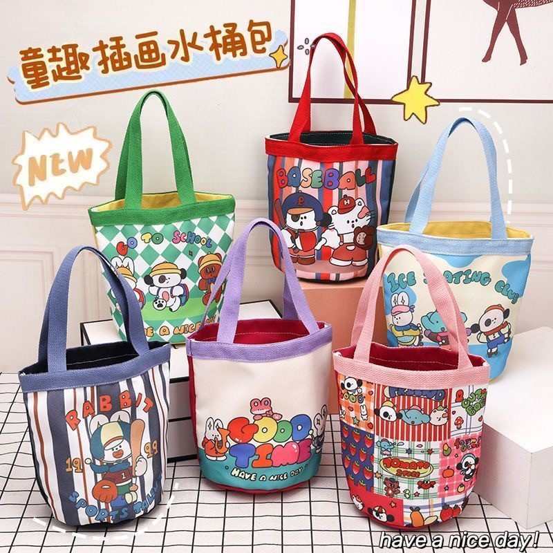可爱插画水桶包女士卡通手提包韩版便捷通勤涂鸦大容量伴手礼袋