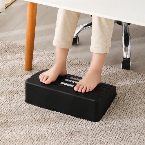 Office foot stool under the table to rest your feet to prevent curling of your legs, a magic tool to step on your feet and put your legs on the stool