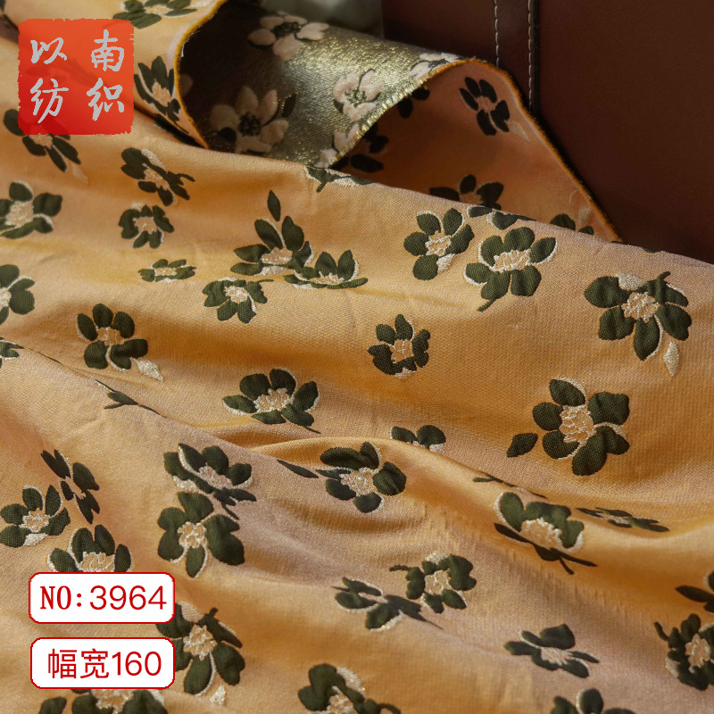 新款橘橙底金丝浮雕小花挺括蓬蓬裙连衣裙面料优雅女装鞋辅提花布