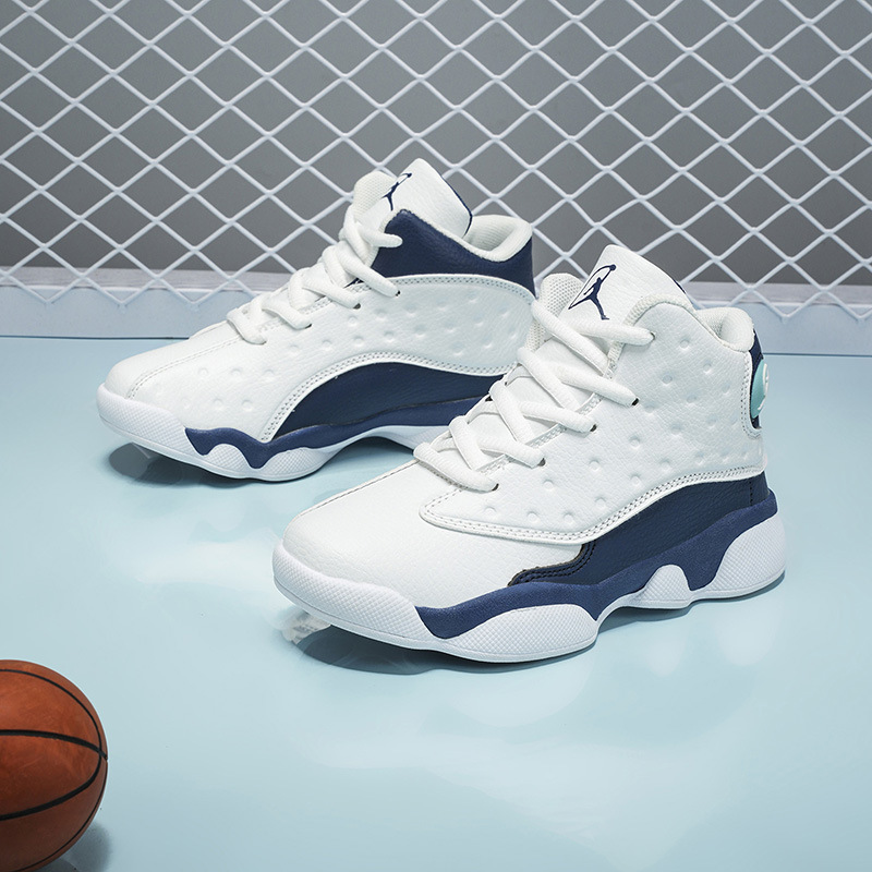 Zapatos de baloncesto para niños, niños y niñas 2025 nuevo cuero impermeable antideslizante zapatos deportivos con suela suave para niños mayores al por mayor