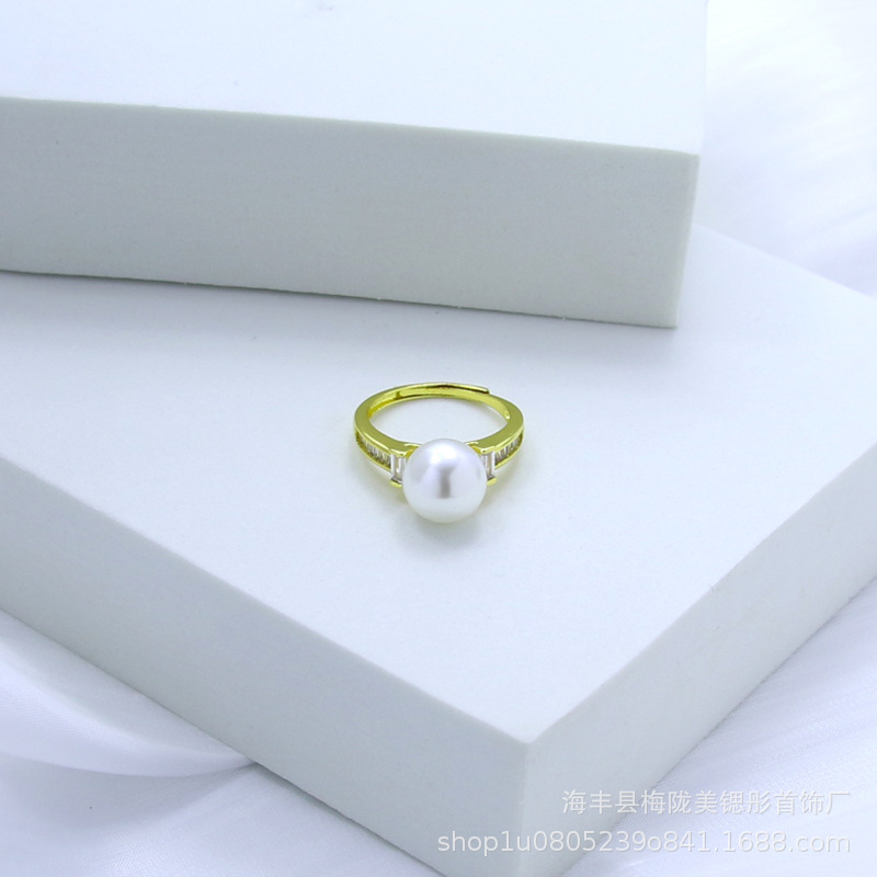 Rectangular small design ring with stone with zircon
