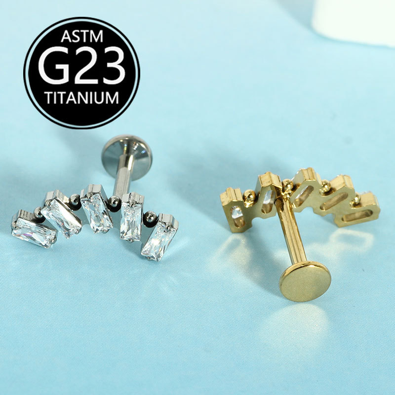 Silver pointed spike labret stud material detail