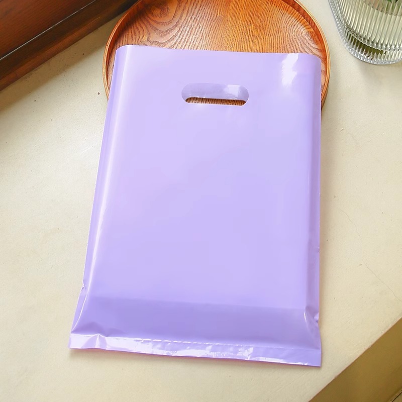 Bolsa de mano de tienda de ropa de grosor, bolsa de embalaje de ropa para niños y niñas, bolsa de almacenamiento de cosméticos, bolsa de regalo, bolsa de embalaje comercial