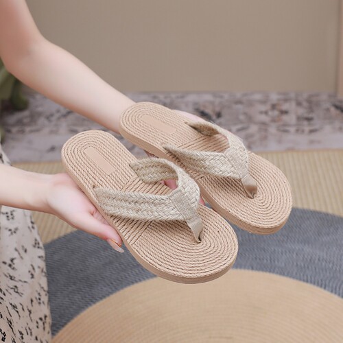 Ethnic style imitation straw weaving tourism imitation hemp sole women's sandals Korean trend wearing a flip-flops fashionable beach girls 'slippers