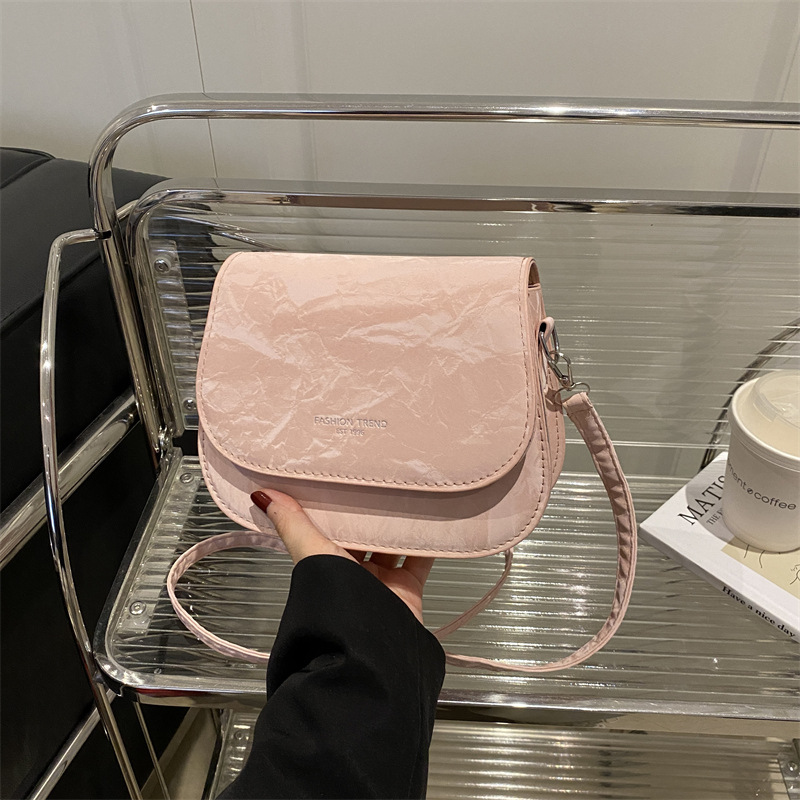 Bolso de silla de montar, bolso de mochila de mujer 2025, nueva moda de verano, moda simple, estilo extranjero, bolso de hombro para mujeres