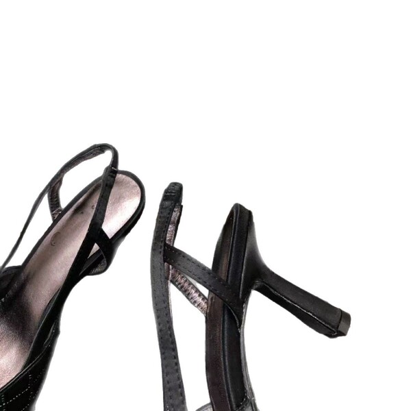 Elegant fashionable high heels with diamond pattern pointed-toe made…