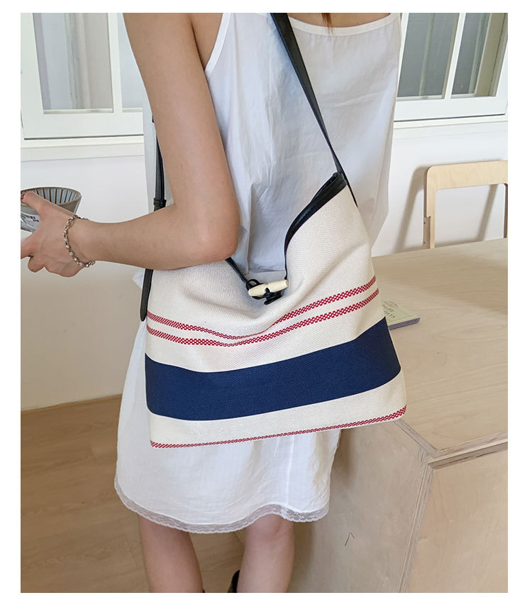 Korean version large-capacity women's 2025 new style fashionable canvas striped single-shoulder underarm bag casual commuting tote bag undefined