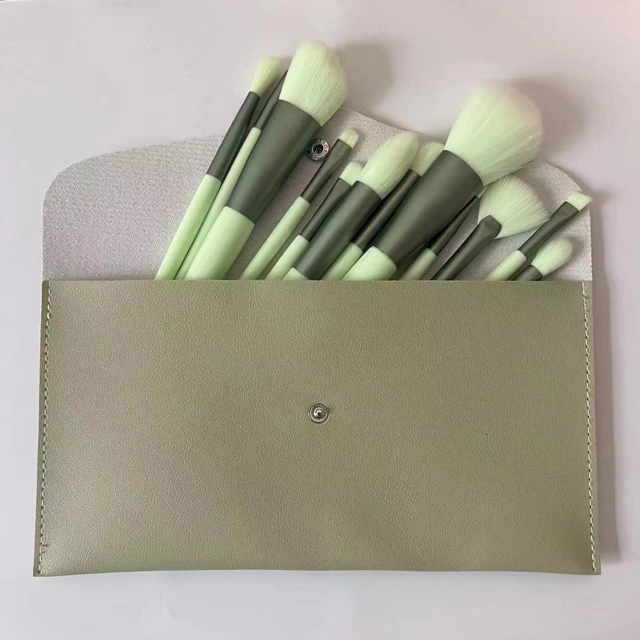 Erxiaomu Xingdong 12 maquillaje cepillo conjunto portátil conjunto completo Cangzhou polvo suelto rubor reparación nariz cepillo suave pelo sin costuras