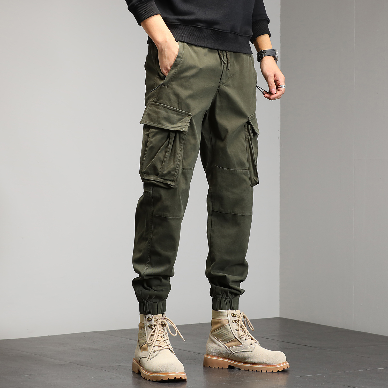 Joven hombre otoño nuevos pantalones de trabajo, pantalones casuales, pantalones de bolsillo simples, ropa de hombre elástica