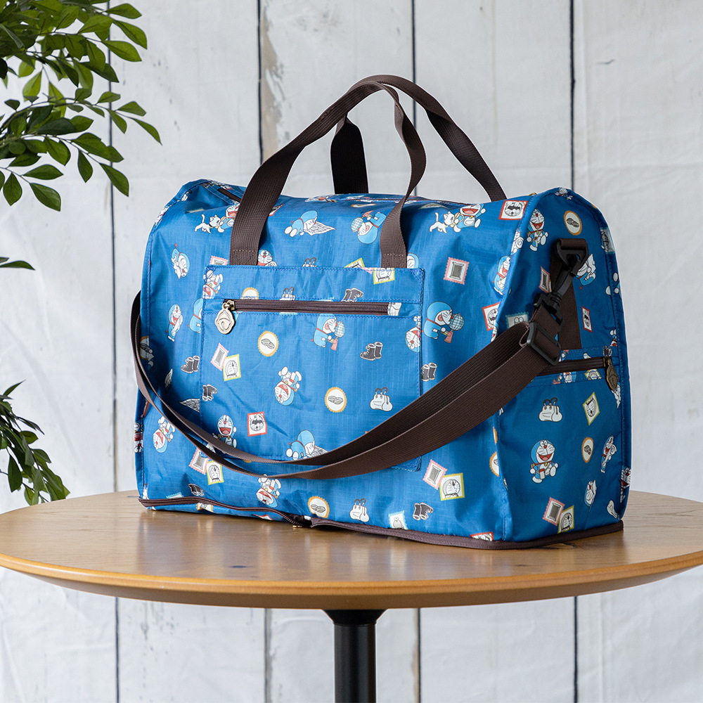 现货可爱哆啦A梦印花手提包单肩包斜挎包可折叠行李袋衣物整理袋