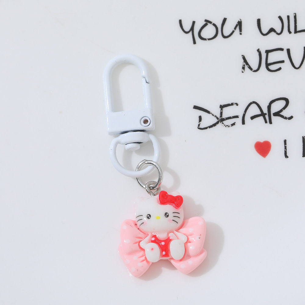 Cartoon Moon Cat DIY accesorios de resina llaveros Sanrio arco gato bolsas colgantes de chicas