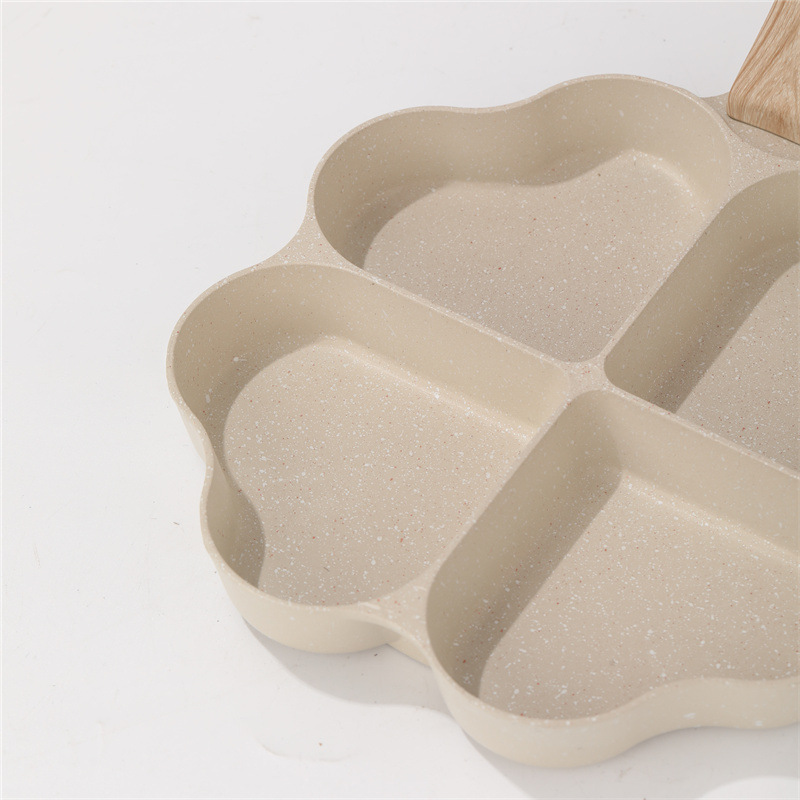 Piedra de arroz casera transfronteriza amor de cuatro agujeros panela de desayuno multifuncional para hamburguesas de tortilla antiadherente