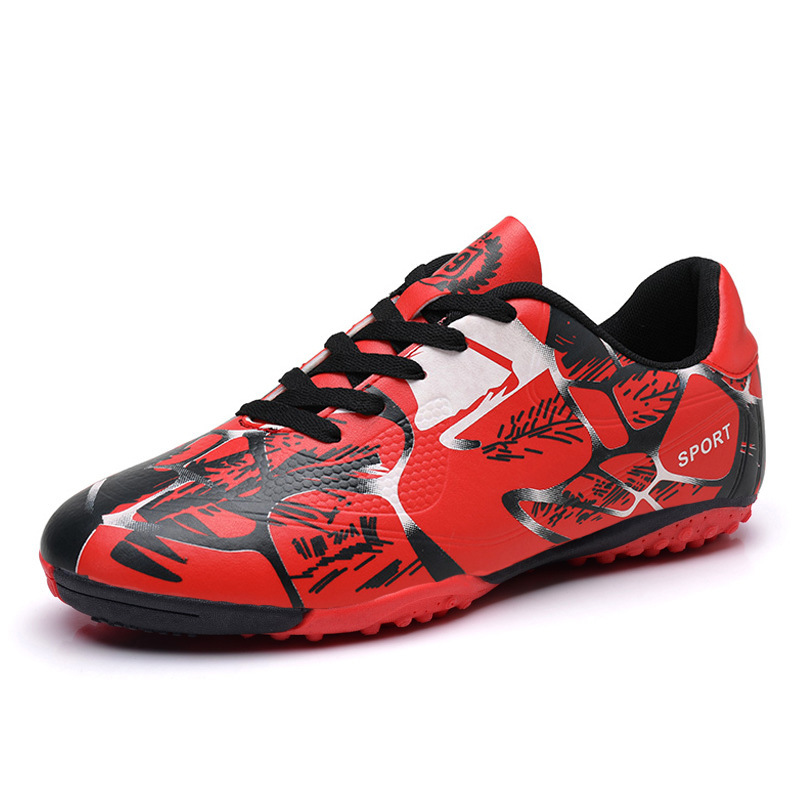 Zapatos de fútbol transfronterizos para adultos hombres y mujeres anti-deslizante artificial zapatos de entrenamiento de clavos de clavos largos estudiantes de primaria al por mayor
