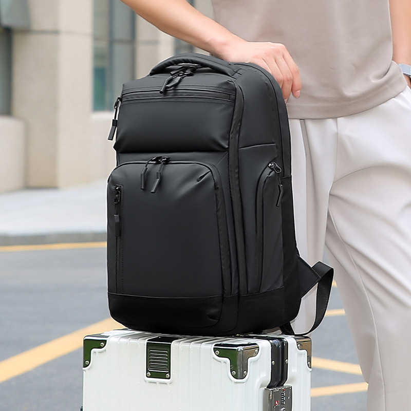 Bolsa de comercio exterior de color sólido de gran capacidad multicapa colgante barra de tracción de negocios bolsa de computadora de negocios mochila a prueba de salpicaduras