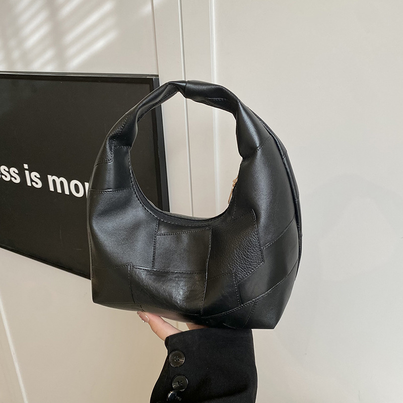 Bolsa de nube estilo minimal pliegue de la axila de la niña pliegue bolsa grande 2025 principios de primavera nuevo bolso de hombro mujer