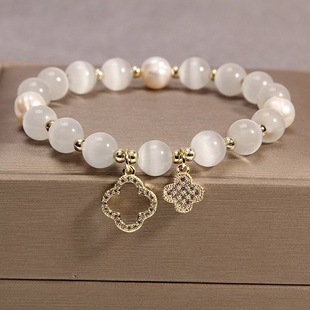 2024 new cat's eye stone bracelet female four-leaf clover crystal bracelet elastic rope pearl transfer bead hand rope wholesale