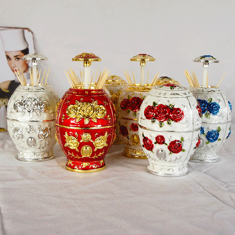 Color electroplated automatic pop-up toothpick holder for guest tea room and restaurant with three flat bottom egg-shaped toothpick holders with roses