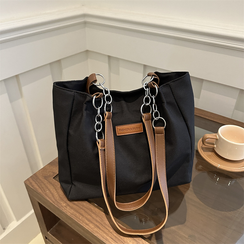 Casual bolsa de viaje de gran capacidad para mujeres 2024 nueva moda bolsa de lona universal bolso de hombro universal bolso simple